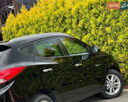 Черный Хендай их35, объемом двигателя 1.69 л и пробегом 238 тыс. км за 11999 $, фото 19 на Automoto.ua