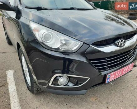 Чорний Хендай іх35, об'ємом двигуна 2 л та пробігом 211 тис. км за 12700 $, фото 23 на Automoto.ua