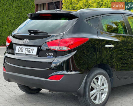 Черный Хендай их35, объемом двигателя 1.69 л и пробегом 238 тыс. км за 11999 $, фото 18 на Automoto.ua