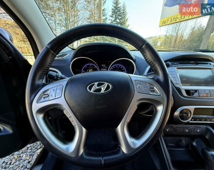 Чорний Хендай іх35, об'ємом двигуна 2 л та пробігом 153 тис. км за 13999 $, фото 48 на Automoto.ua