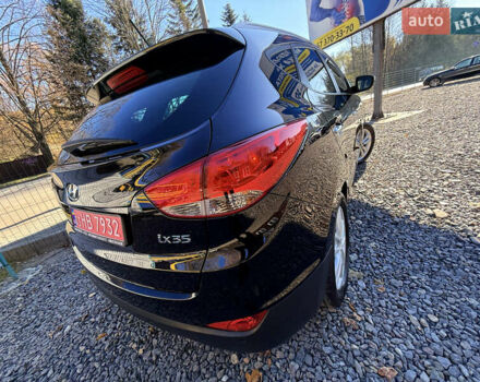 Чорний Хендай іх35, об'ємом двигуна 2 л та пробігом 153 тис. км за 13999 $, фото 12 на Automoto.ua