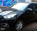 Черный Хендай их35, объемом двигателя 20 л и пробегом 150 тыс. км за 13500 $, фото 1 на Automoto.ua