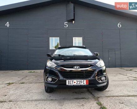 Черный Хендай их35, объемом двигателя 2 л и пробегом 195 тыс. км за 12600 $, фото 1 на Automoto.ua