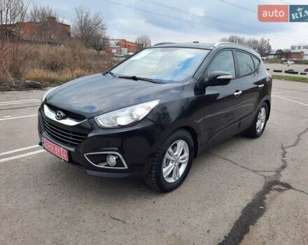 Чорний Хендай іх35, об'ємом двигуна 2 л та пробігом 211 тис. км за 12700 $, фото 7 на Automoto.ua