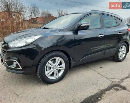 Чорний Хендай іх35, об'ємом двигуна 2 л та пробігом 211 тис. км за 12700 $, фото 121 на Automoto.ua