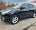 Чорний Хендай іх35, об'ємом двигуна 2 л та пробігом 211 тис. км за 12700 $, фото 121 на Automoto.ua