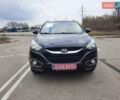 Чорний Хендай іх35, об'ємом двигуна 2 л та пробігом 211 тис. км за 12700 $, фото 4 на Automoto.ua