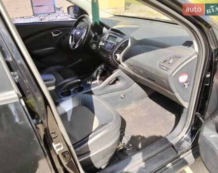 Чорний Хендай іх35, об'ємом двигуна 2 л та пробігом 180 тис. км за 12999 $, фото 7 на Automoto.ua