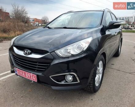 Чорний Хендай іх35, об'ємом двигуна 2 л та пробігом 211 тис. км за 12700 $, фото 118 на Automoto.ua