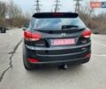 Чорний Хендай іх35, об'ємом двигуна 2 л та пробігом 211 тис. км за 12700 $, фото 14 на Automoto.ua