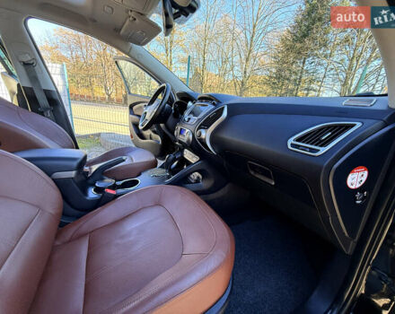 Чорний Хендай іх35, об'ємом двигуна 2 л та пробігом 153 тис. км за 13999 $, фото 70 на Automoto.ua