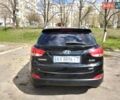 Чорний Хендай іх35, об'ємом двигуна 2 л та пробігом 180 тис. км за 12999 $, фото 4 на Automoto.ua