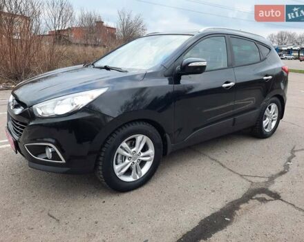 Чорний Хендай іх35, об'ємом двигуна 2 л та пробігом 211 тис. км за 12700 $, фото 8 на Automoto.ua