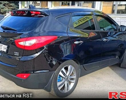 Чорний Хендай іх35, об'ємом двигуна 2 л та пробігом 167 тис. км за 13800 $, фото 3 на Automoto.ua