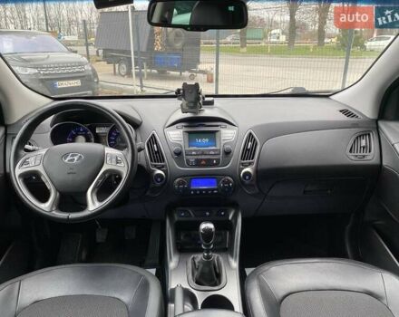 Черный Хендай их35, объемом двигателя 1.69 л и пробегом 194 тыс. км за 12500 $, фото 12 на Automoto.ua