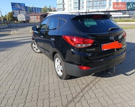 Чорний Хендай іх35, об'ємом двигуна 2 л та пробігом 237 тис. км за 12950 $, фото 18 на Automoto.ua