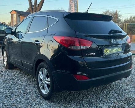 Чорний Хендай іх35, об'ємом двигуна 2 л та пробігом 178 тис. км за 13700 $, фото 6 на Automoto.ua