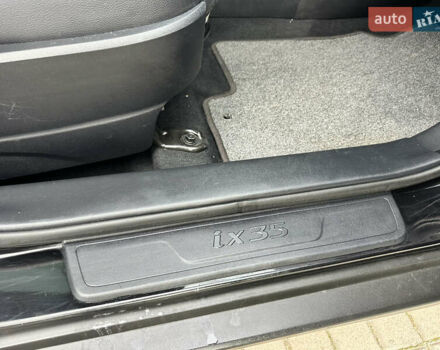 Чорний Хендай іх35, об'ємом двигуна 2 л та пробігом 148 тис. км за 14599 $, фото 40 на Automoto.ua
