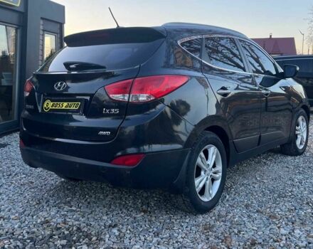 Чорний Хендай іх35, об'ємом двигуна 2 л та пробігом 178 тис. км за 13700 $, фото 4 на Automoto.ua