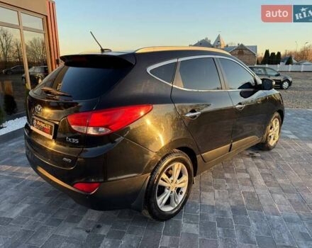 Черный Хендай их35, объемом двигателя 2 л и пробегом 178 тыс. км за 12699 $, фото 8 на Automoto.ua