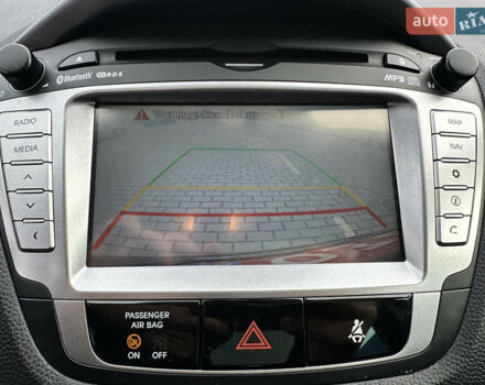 Чорний Хендай іх35, об'ємом двигуна 2 л та пробігом 148 тис. км за 14599 $, фото 31 на Automoto.ua