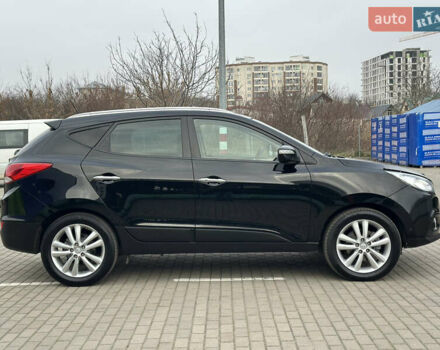 Чорний Хендай іх35, об'ємом двигуна 2 л та пробігом 148 тис. км за 14599 $, фото 3 на Automoto.ua