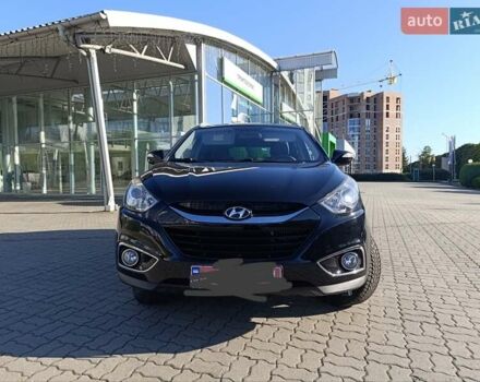 Чорний Хендай іх35, об'ємом двигуна 2 л та пробігом 237 тис. км за 12950 $, фото 25 на Automoto.ua