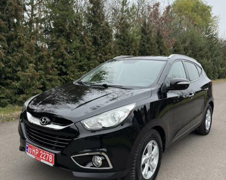 Чорний Хендай іх35, об'ємом двигуна 2 л та пробігом 177 тис. км за 14650 $, фото 6 на Automoto.ua