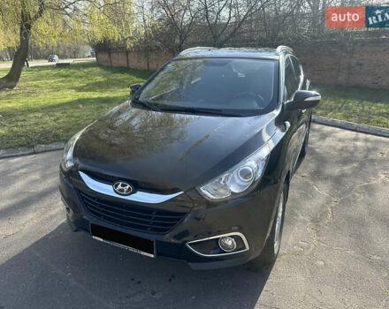 Черный Хендай их35, объемом двигателя 2 л и пробегом 48 тыс. км за 15500 $, фото 1 на Automoto.ua