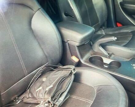 Черный Хендай их35, объемом двигателя 2 л и пробегом 185 тыс. км за 14399 $, фото 1 на Automoto.ua