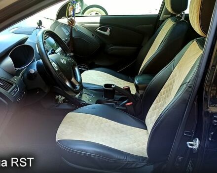 Чорний Хендай іх35, об'ємом двигуна 2 л та пробігом 167 тис. км за 13800 $, фото 7 на Automoto.ua