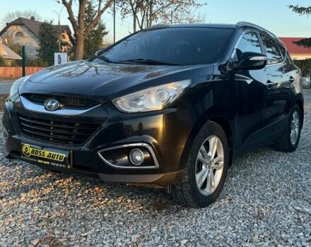 Чорний Хендай іх35, об'ємом двигуна 2 л та пробігом 178 тис. км за 13700 $, фото 3 на Automoto.ua