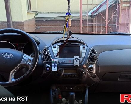 Чорний Хендай іх35, об'ємом двигуна 2 л та пробігом 167 тис. км за 13800 $, фото 6 на Automoto.ua