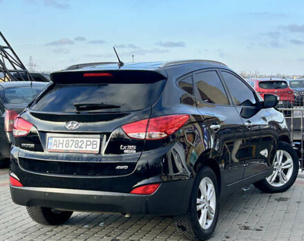 Чорний Хендай іх35, об'ємом двигуна 2 л та пробігом 241 тис. км за 14400 $, фото 16 на Automoto.ua