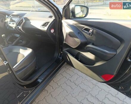 Чорний Хендай іх35, об'ємом двигуна 2 л та пробігом 237 тис. км за 12950 $, фото 33 на Automoto.ua