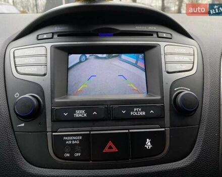 Черный Хендай их35, объемом двигателя 1.69 л и пробегом 194 тыс. км за 12500 $, фото 13 на Automoto.ua