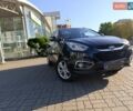 Чорний Хендай іх35, об'ємом двигуна 2 л та пробігом 237 тис. км за 12950 $, фото 1 на Automoto.ua