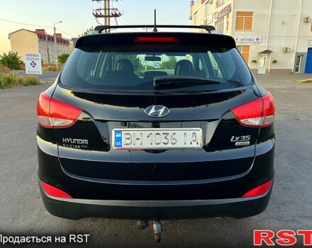Черный Хендай их35, объемом двигателя 1.7 л и пробегом 230 тыс. км за 11200 $, фото 4 на Automoto.ua