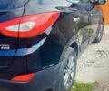 Чорний Хендай іх35, об'ємом двигуна 2 л та пробігом 185 тис. км за 14399 $, фото 1 на Automoto.ua