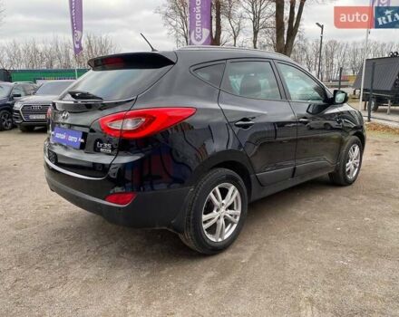 Черный Хендай их35, объемом двигателя 1.69 л и пробегом 194 тыс. км за 12500 $, фото 4 на Automoto.ua