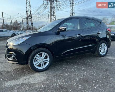 Черный Хендай их35, объемом двигателя 2 л и пробегом 213 тыс. км за 16500 $, фото 4 на Automoto.ua