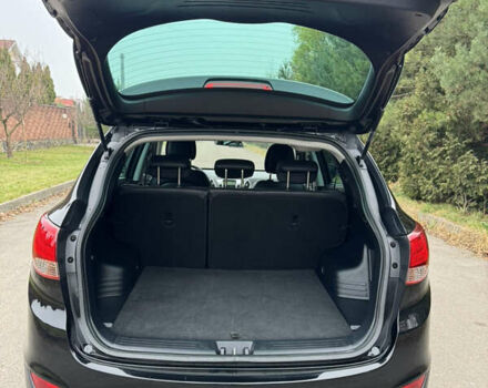 Чорний Хендай іх35, об'ємом двигуна 2 л та пробігом 177 тис. км за 14650 $, фото 58 на Automoto.ua