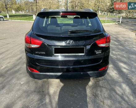 Черный Хендай их35, объемом двигателя 2 л и пробегом 48 тыс. км за 15500 $, фото 6 на Automoto.ua