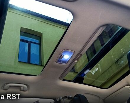 Чорний Хендай іх35, об'ємом двигуна 2 л та пробігом 167 тис. км за 13800 $, фото 4 на Automoto.ua