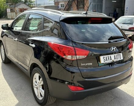 Черный Хендай их35, объемом двигателя 1.7 л и пробегом 128 тыс. км за 3900 $, фото 5 на Automoto.ua