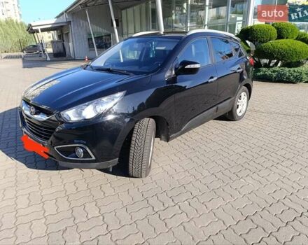 Чорний Хендай іх35, об'ємом двигуна 2 л та пробігом 237 тис. км за 12950 $, фото 24 на Automoto.ua
