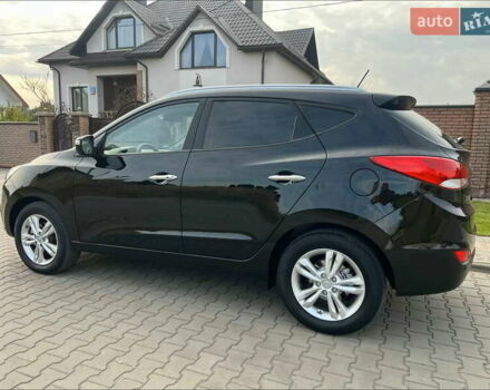 Черный Хендай их35, объемом двигателя 2 л и пробегом 202 тыс. км за 15700 $, фото 16 на Automoto.ua