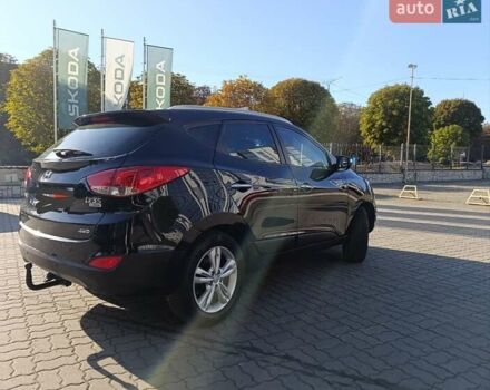 Чорний Хендай іх35, об'ємом двигуна 2 л та пробігом 237 тис. км за 12950 $, фото 23 на Automoto.ua