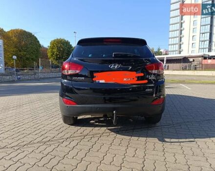 Чорний Хендай іх35, об'ємом двигуна 2 л та пробігом 237 тис. км за 12950 $, фото 17 на Automoto.ua