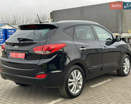 Чорний Хендай іх35, об'ємом двигуна 2 л та пробігом 148 тис. км за 14599 $, фото 4 на Automoto.ua